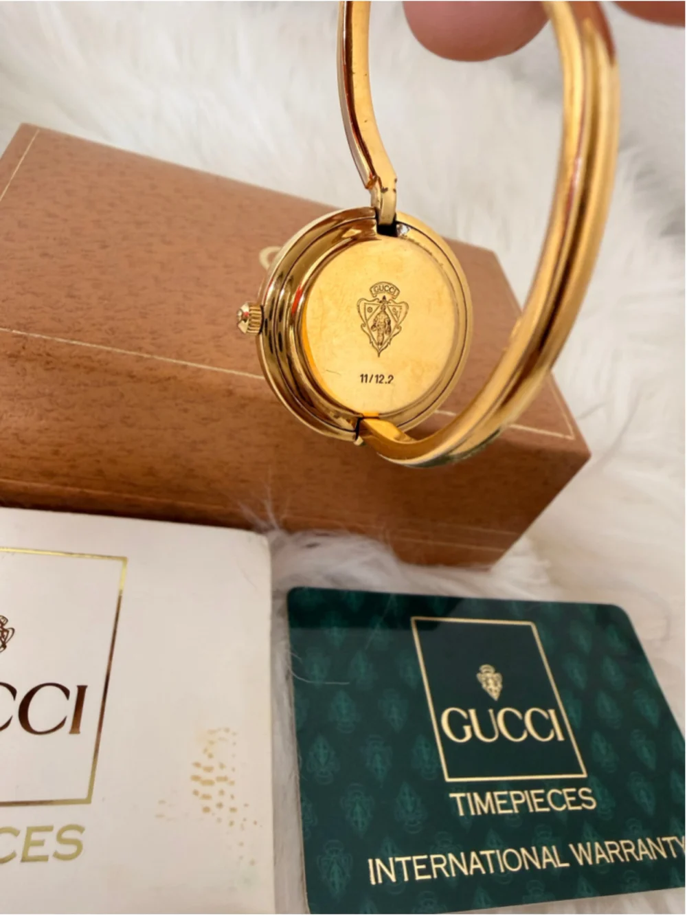 Gucci 11/12.2 Interchangeable Bezel Bangle Watch, w/ 12 bezels, box & paperwork